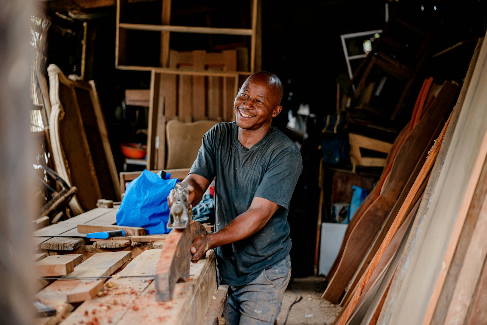 A carpenter at work in his shop